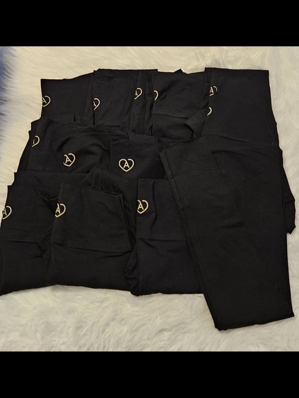 TNA Black Leggings with Small Gold Heart Logo